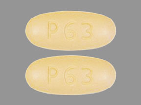 Pill P63 P63 Beige Oval is Ezetimibe and Simvastatin