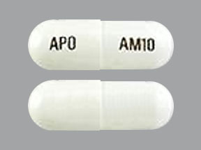 Pill APO AM10 White Capsule/Oblong is Atomoxetine Hydrochloride