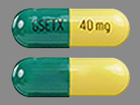 Pill GSETX 40 mg Green & Yellow Capsule/Oblong is Carvedilol Phosphate Extended-Release