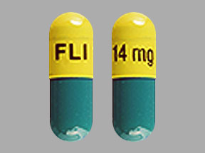 Pill FLI 14 mg Yellow Capsule-shape is Namenda XR
