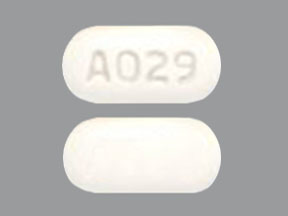 Pill A029 White Capsule/Oblong is Ezetimibe and Simvastatin