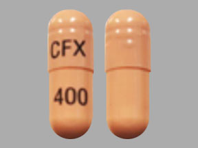 Pill CFX 400 Pink Capsule/Oblong is Cefixime Trihydrate