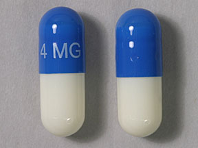 Pill 4 MG Blue & White Capsule-shape is Zanaflex