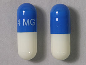 Pill 4 MG Blue & White Capsule/Oblong is Zanaflex