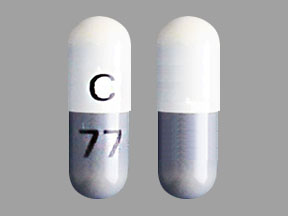 Pill C 77 Gray & White Capsule/Oblong is Minocycline Hydrochloride