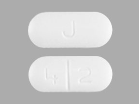 Pill J 4 2 White Capsule/Oblong is Modafinil