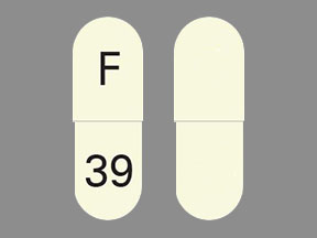 Pill F 39 White Capsule-shape is Ziprasidone Hydrochloride