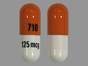Pill 710 125 mcg Orange & White Capsule-shape is Dofetilide