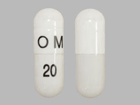 Pill OM 20 White Capsule-shape is Omeprazole Delayed-Release