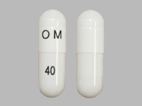 Pill OM 40 White Capsule/Oblong is Omeprazole Delayed-Release