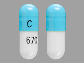 Pill C 670 Blue & White Capsule/Oblong is Tizanidine Hydrochloride