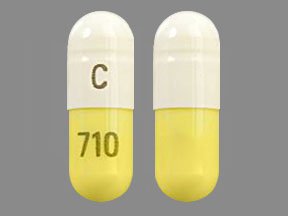 Pill C 710 White & Yellow Capsule/Oblong is Clomipramine Hydrochloride