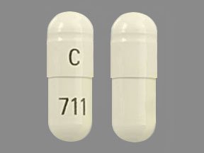 Pill C 711 White Capsule/Oblong is Clomipramine Hydrochloride