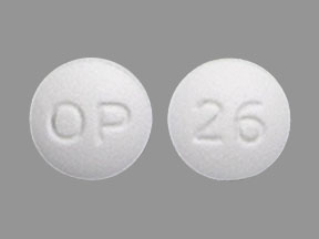 Pill OP 26 White Round is Miglitol