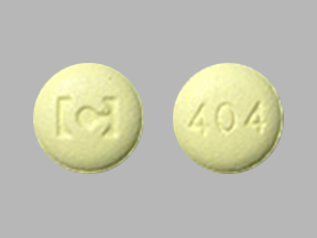 Pill C 404 Yellow Round is Tiagabine Hydrochloride