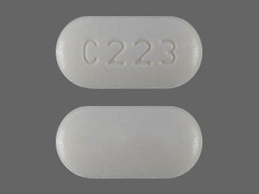 Pill C223 White Capsule/Oblong is Alendronate Sodium