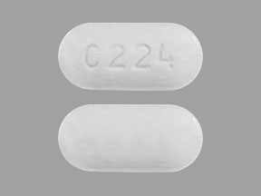 Pill C224 White Capsule/Oblong is Alendronate Sodium