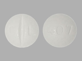 Pill C L 407 White Round is Metoprolol Succinate Extended-Release