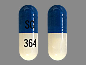 Pill SG 364 Blue & White Capsule/Oblong is Omeprazole and Sodium Bicarbonate