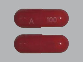 Pill A 100 Red Capsule/Oblong is Amantadine Hydrochloride