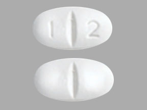 Pill 1 2 White Capsule/Oblong is Gabapentin