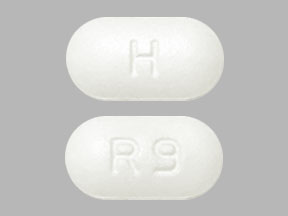 Pill H R9 White Capsule/Oblong is Ritonavir