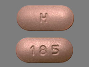 Pill H 185 Purple Capsule/Oblong is Valsartan