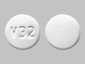 Pill V32 White Round is Albendazole