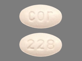 Pill cor 228 Orange Oval is Molindone Hydrochloride