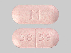 Pill M 58 59 Pink Capsule/Oblong is Metaxalone