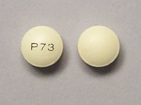 Pill P73 Yellow Round is Aspirin Enteric Coated