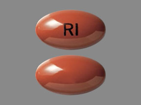 Pill RI Brown Capsule/Oblong is Zenatane
