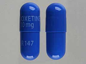 Pill FLUOXETINE 10mg R147 Blue Capsule/Oblong is Fluoxetine Hydrochloride