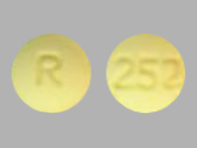 Pill R 252 Yellow Round is Carvedilol