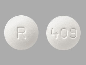 Pill R 409 White Round is Amlodipine Besylate and Atorvastatin Calcium