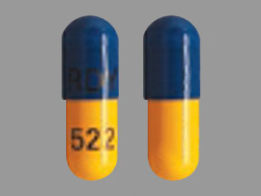Pill RDY 522 Blue & Yellow Capsule-shape is Atomoxetine Hydrochloride