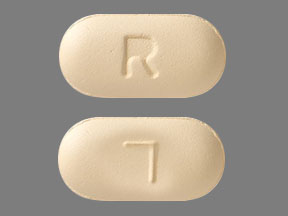 Pill R 7 Yellow Capsule/Oblong is Quetiapine Fumarate