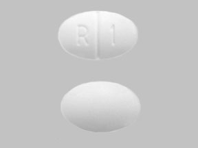 Pill R 1 White Oval is Rymed
