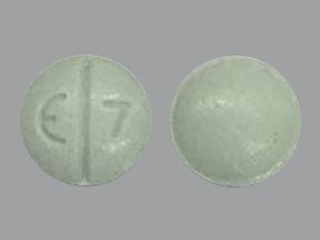 Pill E 7 Green Round is Oxycodone Hydrochloride