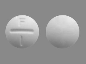 Pill F 1 White Round is Fluoritab