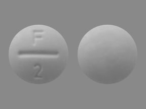 Pill F 2 is Fluoritab 2.2 mg (equiv. fluoride 1 mg)