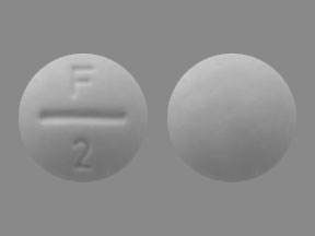 Pill F 2 White Round is Fluoritab