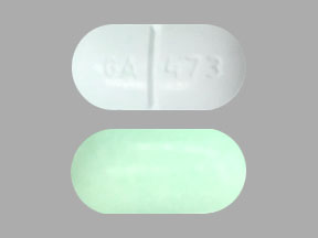 Pill GA 473 Green Oval is Aspirin, Caffeine and Orphenadrine Citrate