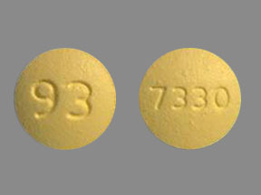 Pill 93 7330 Yellow Round is Fenofibrate