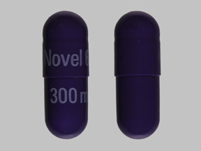 Pill Novel 660 300 mg Purple Capsule/Oblong is Trimethobenzamide Hydrochloride