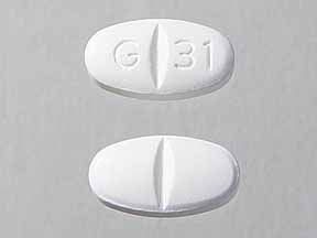 Pill G 31 White Elliptical/Oval is Gabapentin