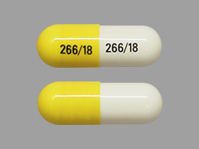 Pill 266 18 266 18 White & Yellow Capsule/Oblong is Atomoxetine Hydrochloride