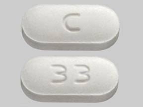 Pill C 33 White Capsule/Oblong is Sumatriptan Succinate