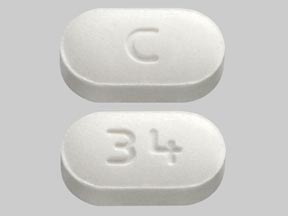 Pill C 34 White Capsule/Oblong is Sumatriptan Succinate