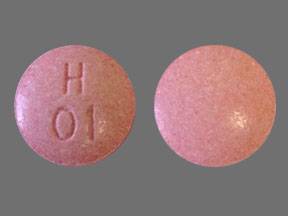 Pill H 01 Pink Round is Fluconazole